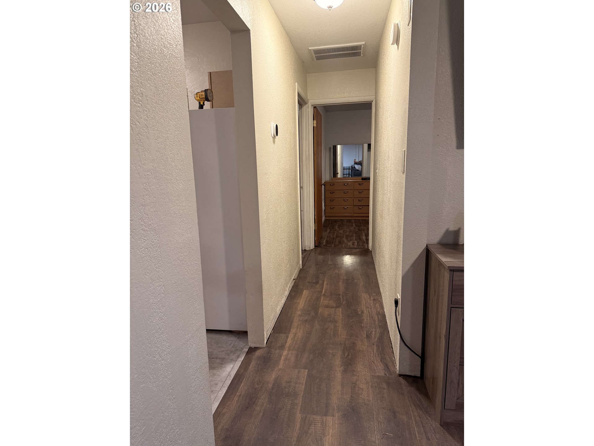 75840 Leezer Avenue Echo, OR 97826 - Photo 12 of 21 a hallway with sliding door and stairs