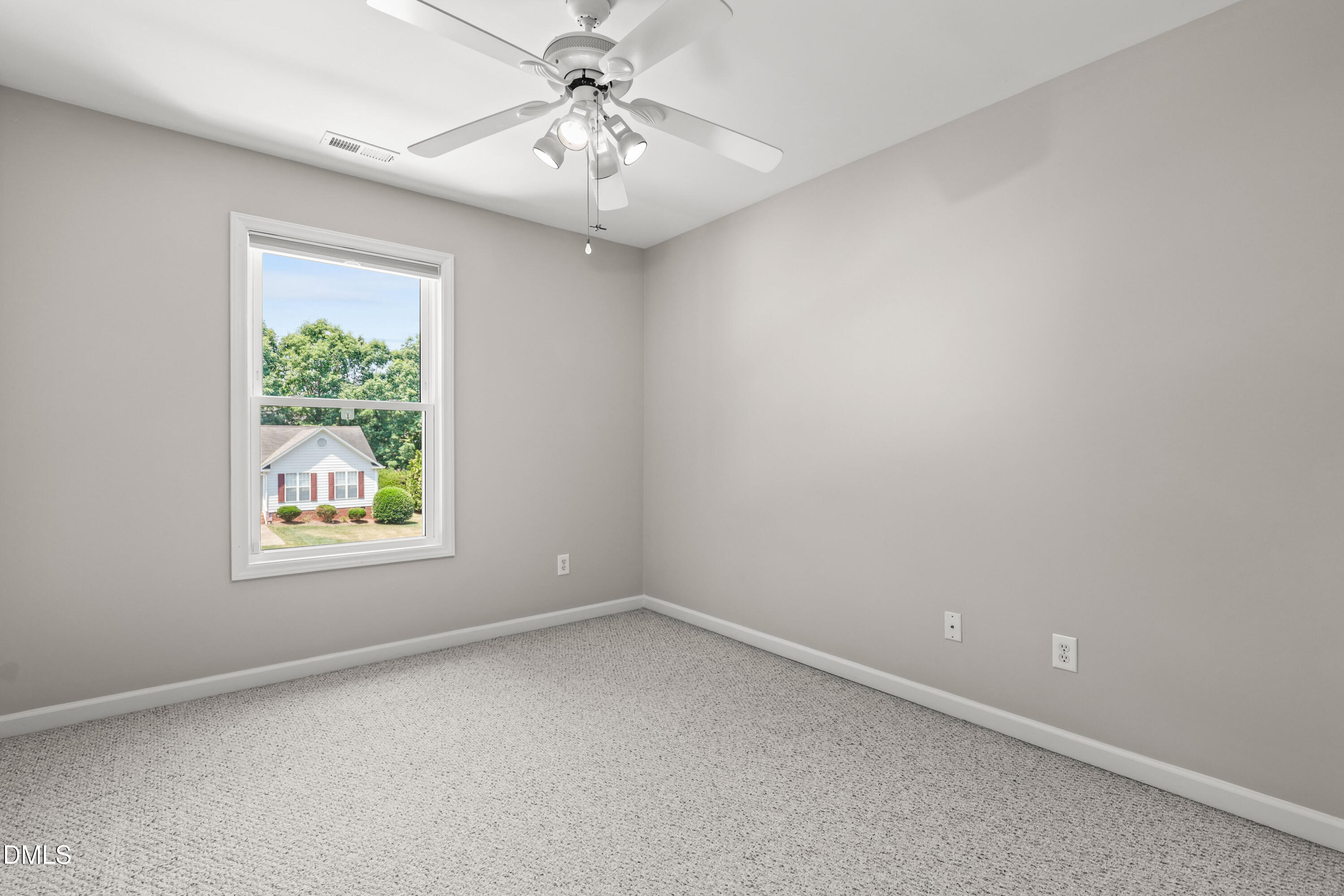 3015 Rennit Court Raleigh, NC 27603 - Photo 27 of 40 an empty room with a window