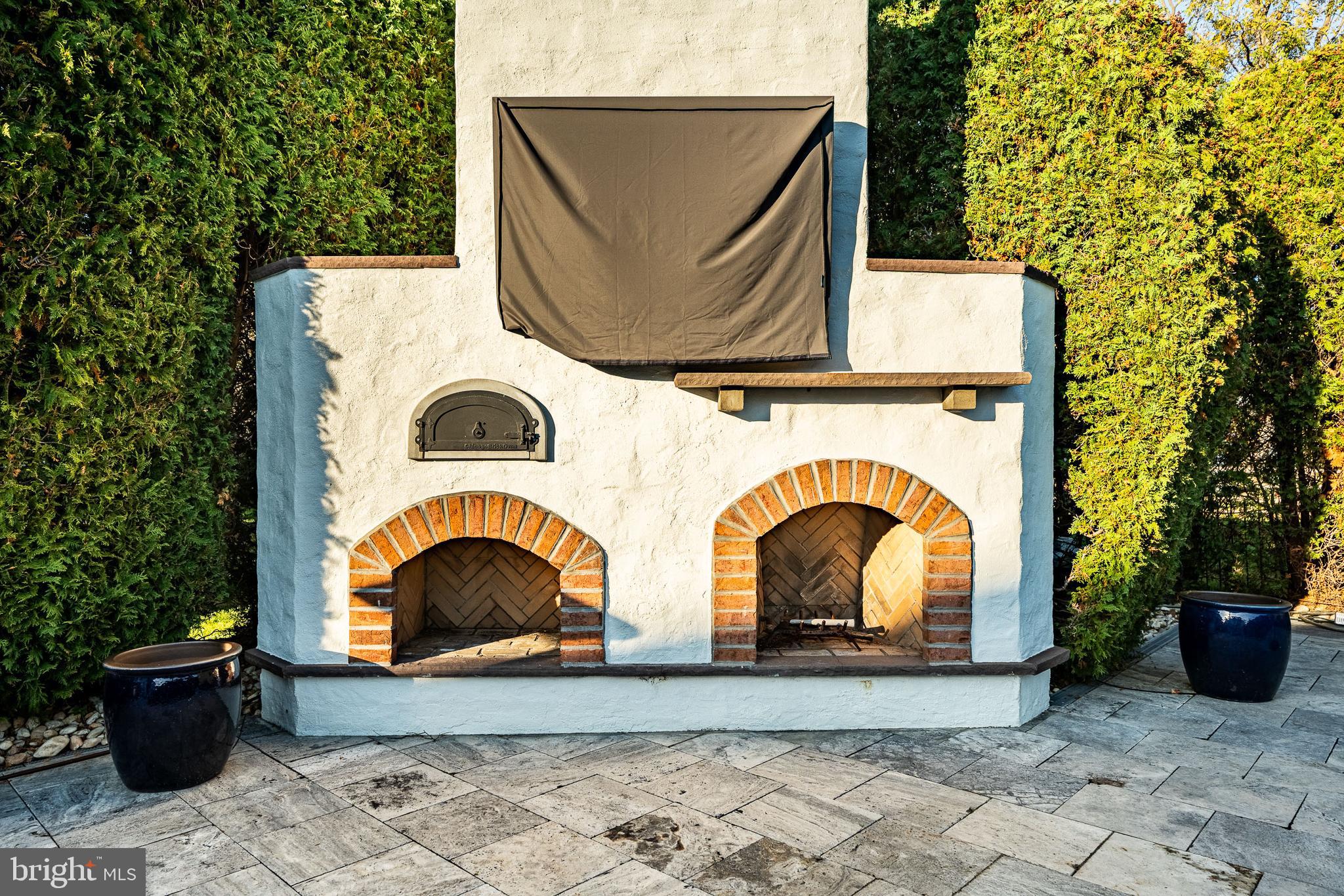 1053 Whitegate Road Wayne, PA 19087 - Photo 40 of 51 Custom built in Fireplace with Pizza Oven.