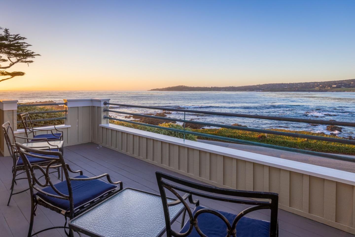 26177 Scenic Road Carmel, CA 93923 - Photo 19 of 30 a view of a chairs and table on the terrace