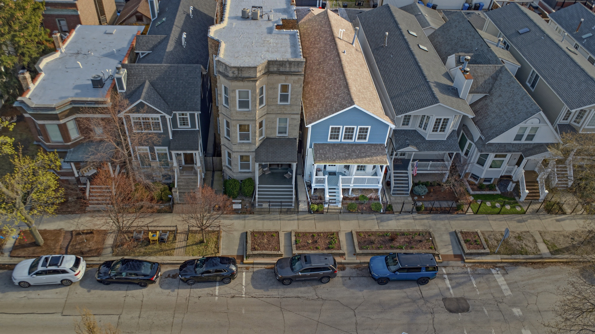 2229 West School Street Chicago, IL 60618 - Photo 23 of 29 an aerial view of a building with parked cars