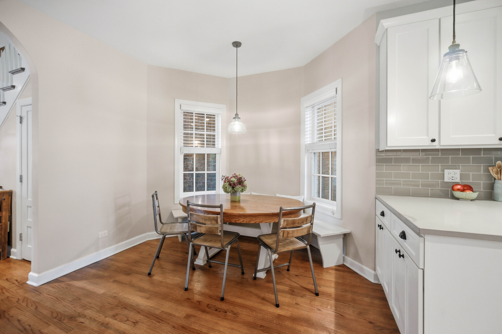 2229 West School Street Chicago, IL 60618 - Photo 7 of 29 a view of a dining room with furniture and wooden floor