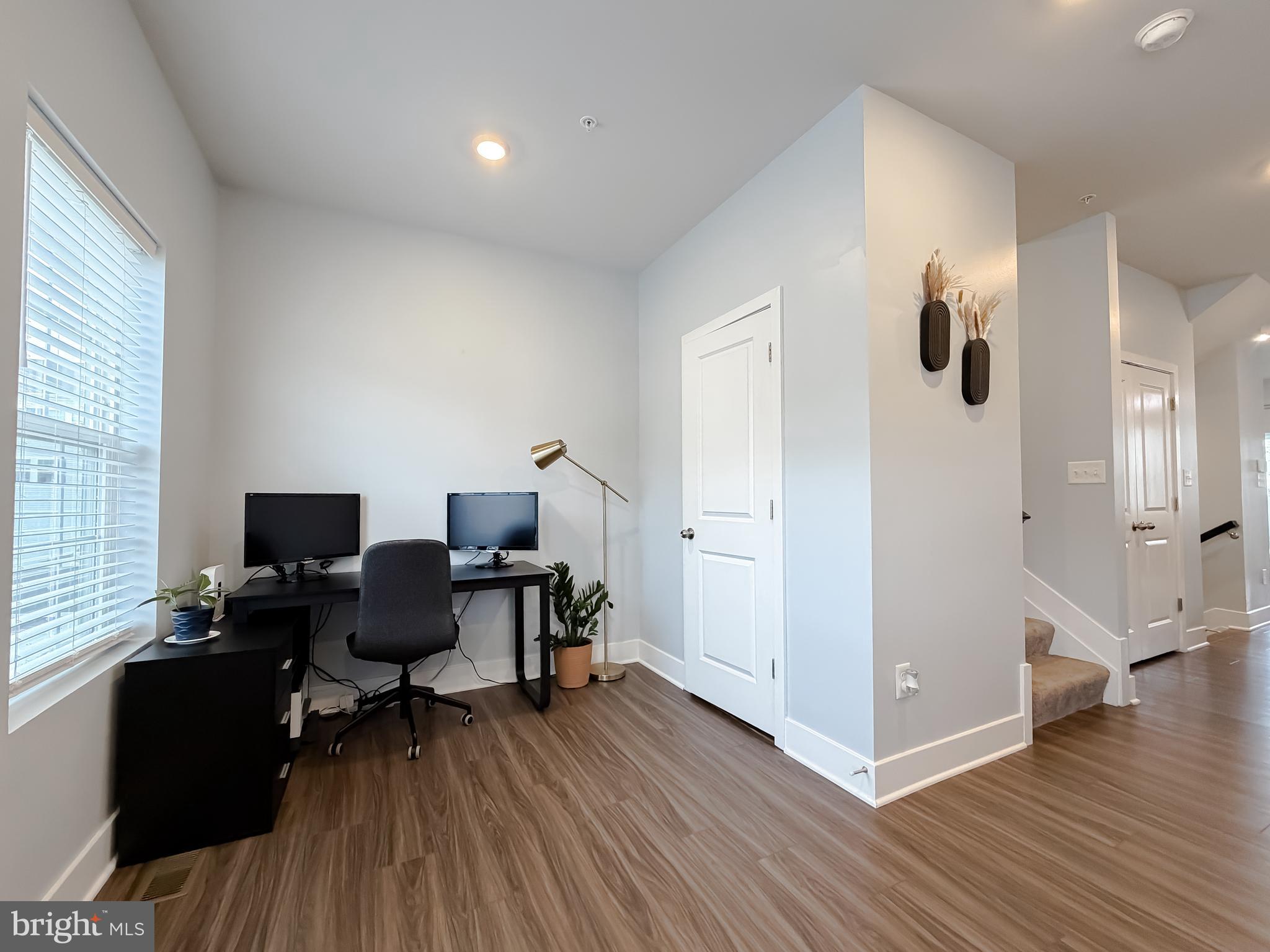 23658 Crosswinds Way California, MD 20619 - Photo 28 of 54 Additional space off dining area, staircase view