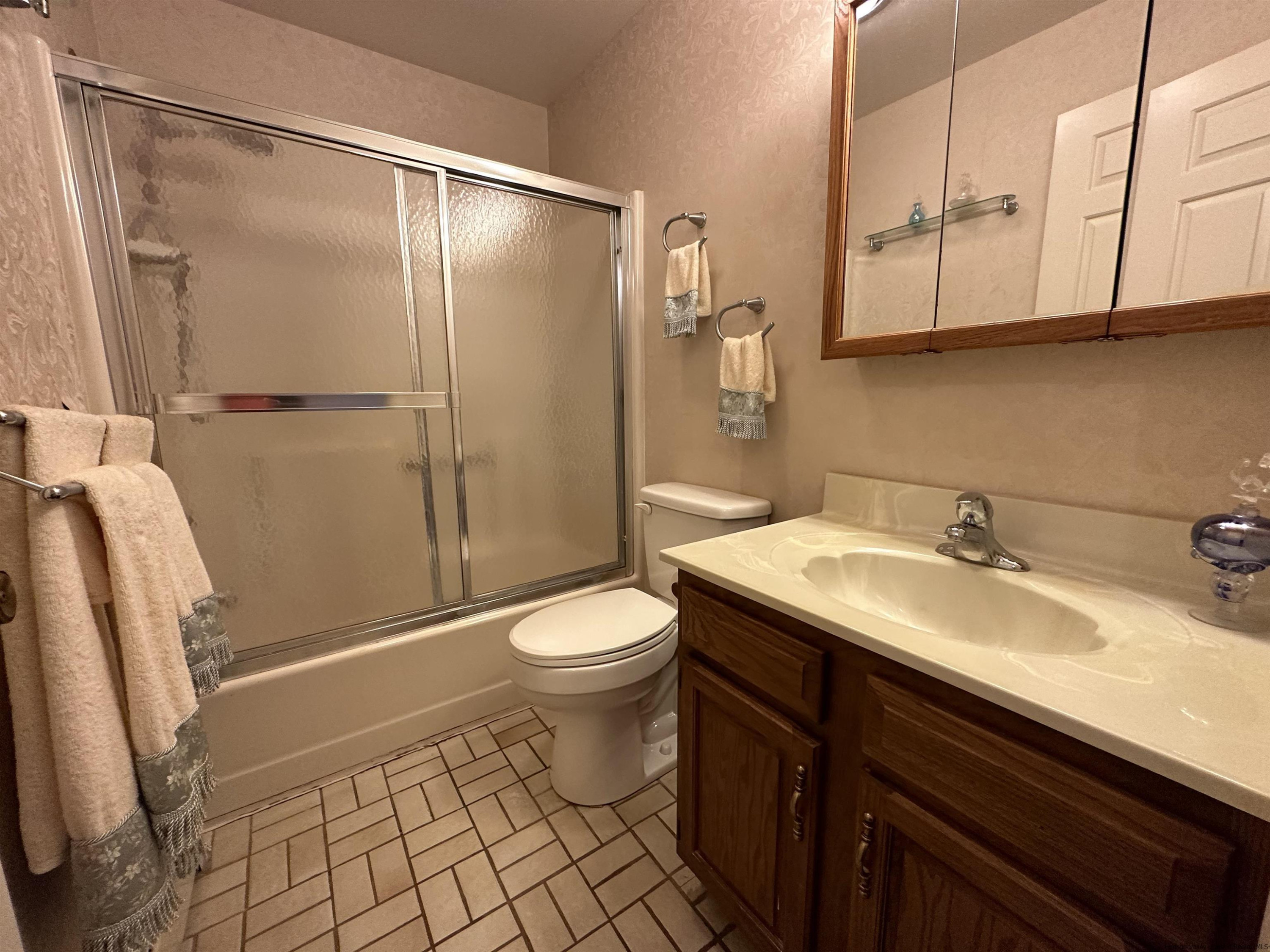 343 Cascade Drive Kingston, NY 12401 - Photo 14 of 33 a bathroom with a sink a toilet and shower