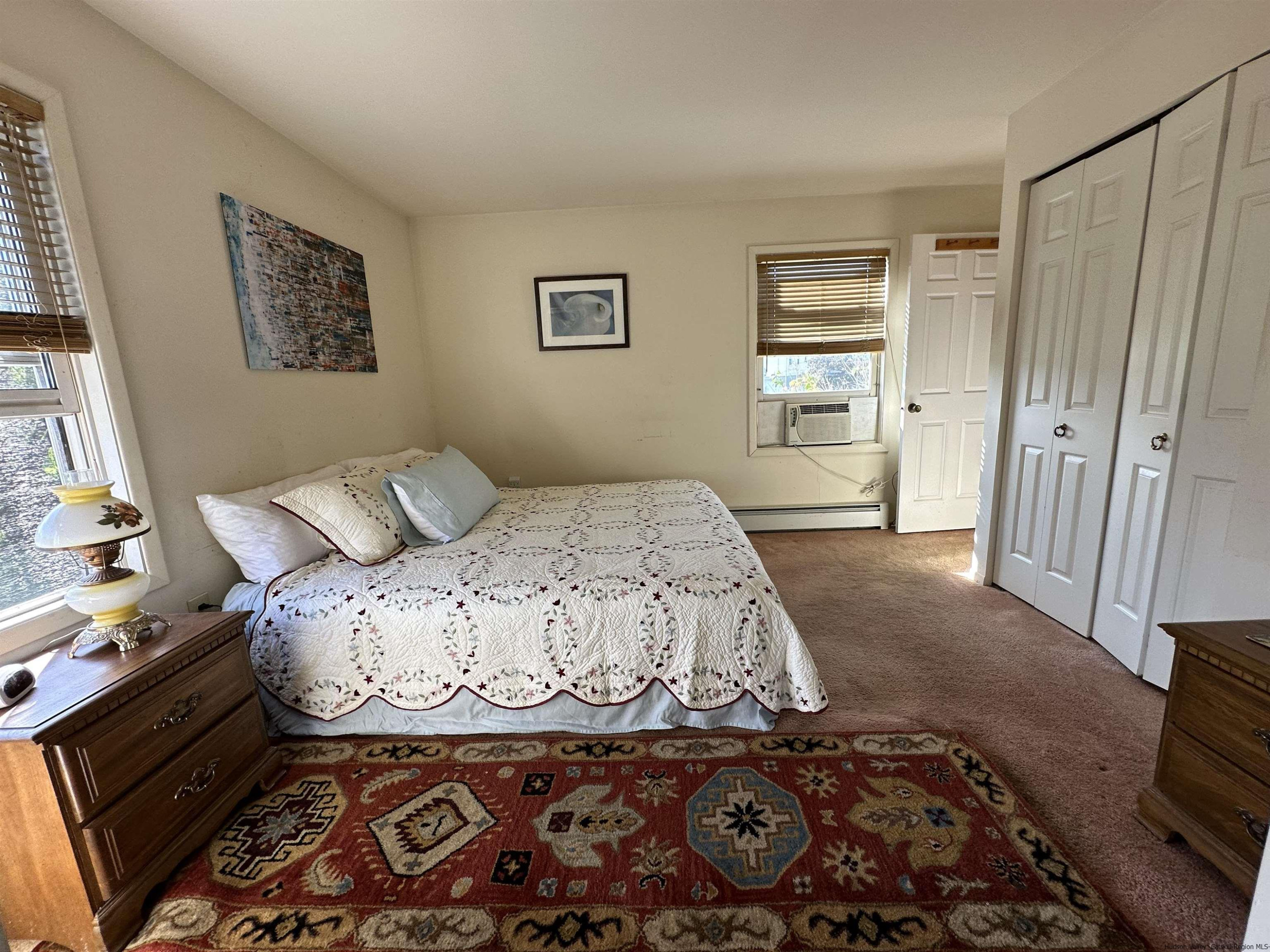 343 Cascade Drive Kingston, NY 12401 - Photo 17 of 33 a bedroom with a bed and a couch