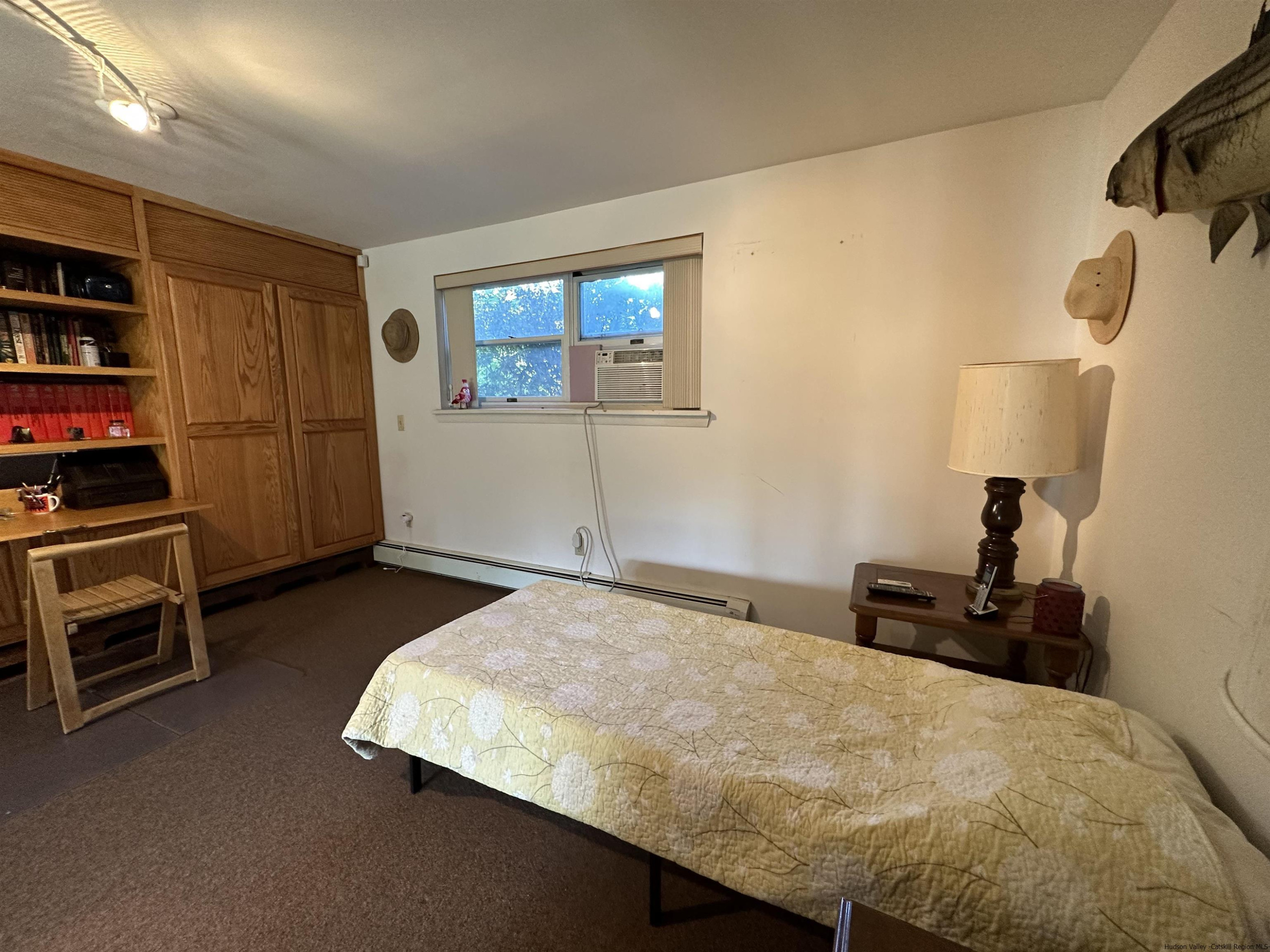 343 Cascade Drive Kingston, NY 12401 - Photo 22 of 33 a bedroom with a bed and furniture