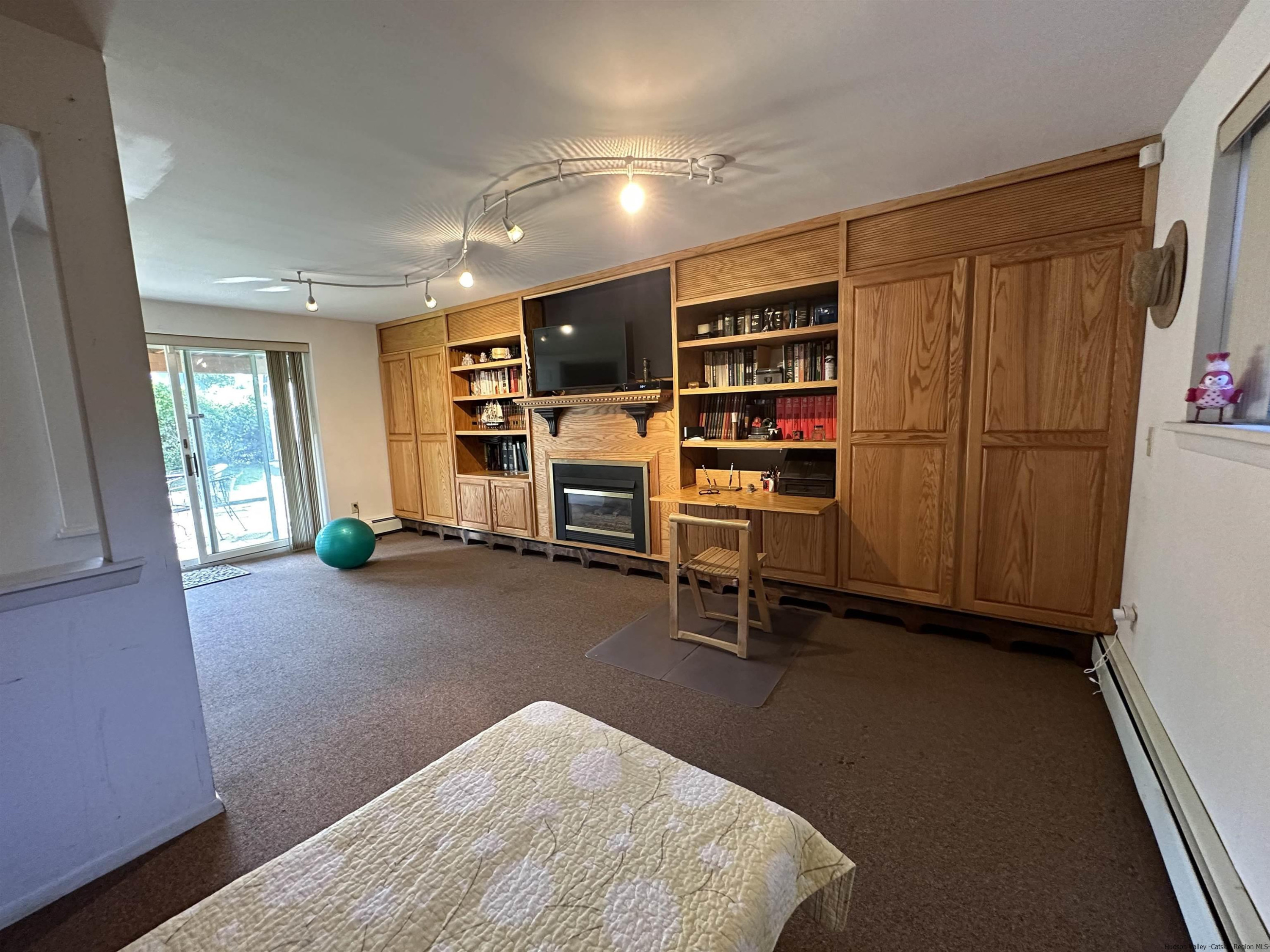 343 Cascade Drive Kingston, NY 12401 - Photo 24 of 33 a view of a livingroom with furniture and an empty room