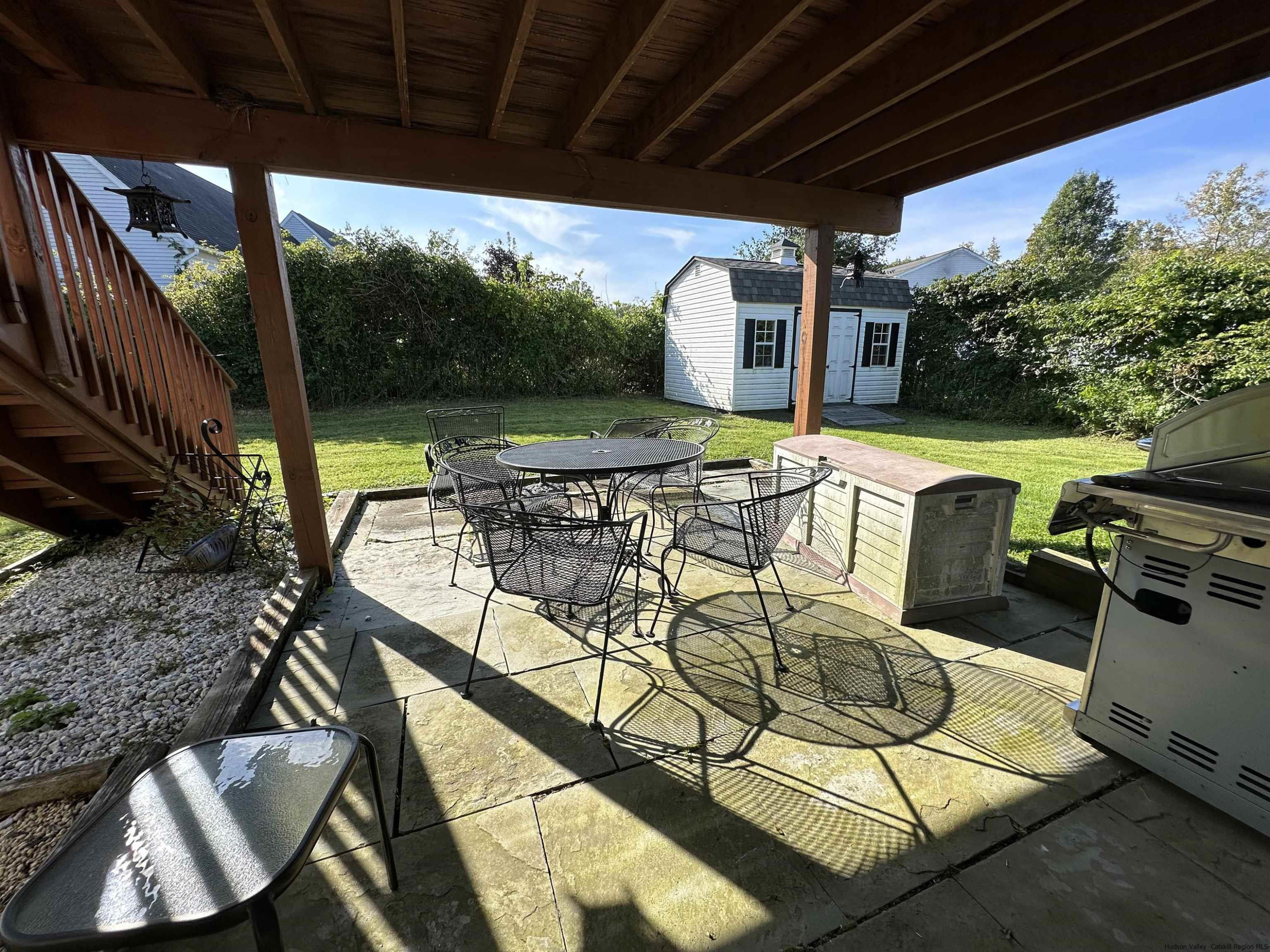 343 Cascade Drive Kingston, NY 12401 - Photo 27 of 33 a patio with glass top table and chairs