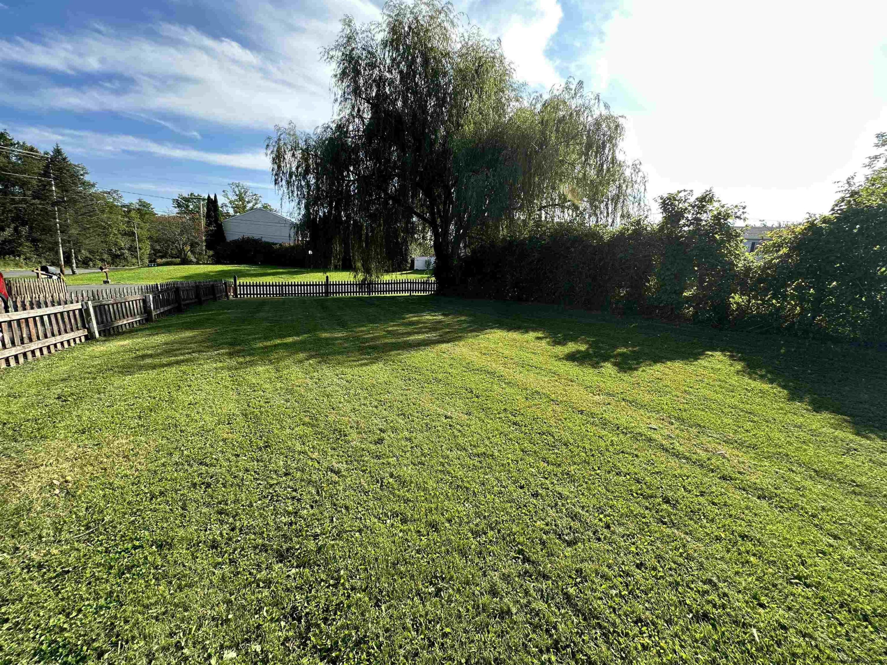 343 Cascade Drive Kingston, NY 12401 - Photo 30 of 33 a view of a golf course with a lake