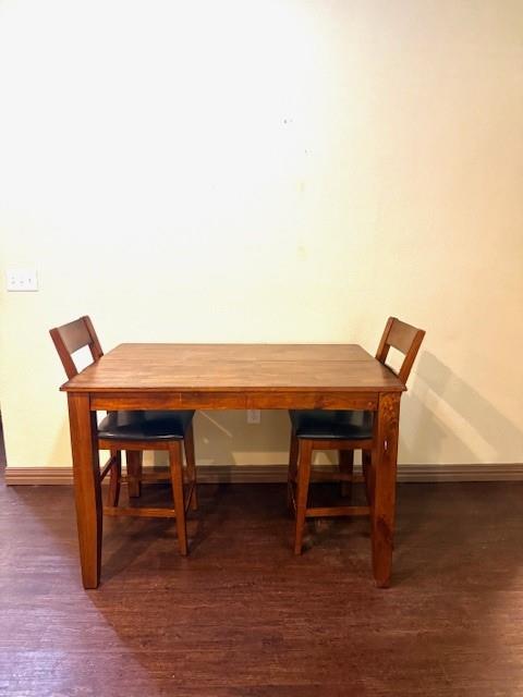 2410 South 2nd Street, Unit 1162 Waco, TX 76706 - Photo 18 of 33 a view of a dining room with furniture and wooden floor
