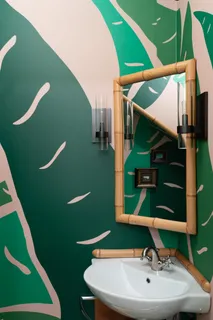 a bathroom with a toilet tub and a shower