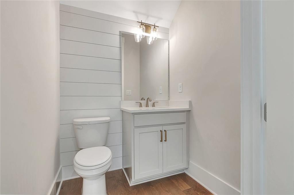 170 Rolison Way Fayetteville, GA 30214 - Photo 15 of 49 a bathroom with a toilet sink and mirror