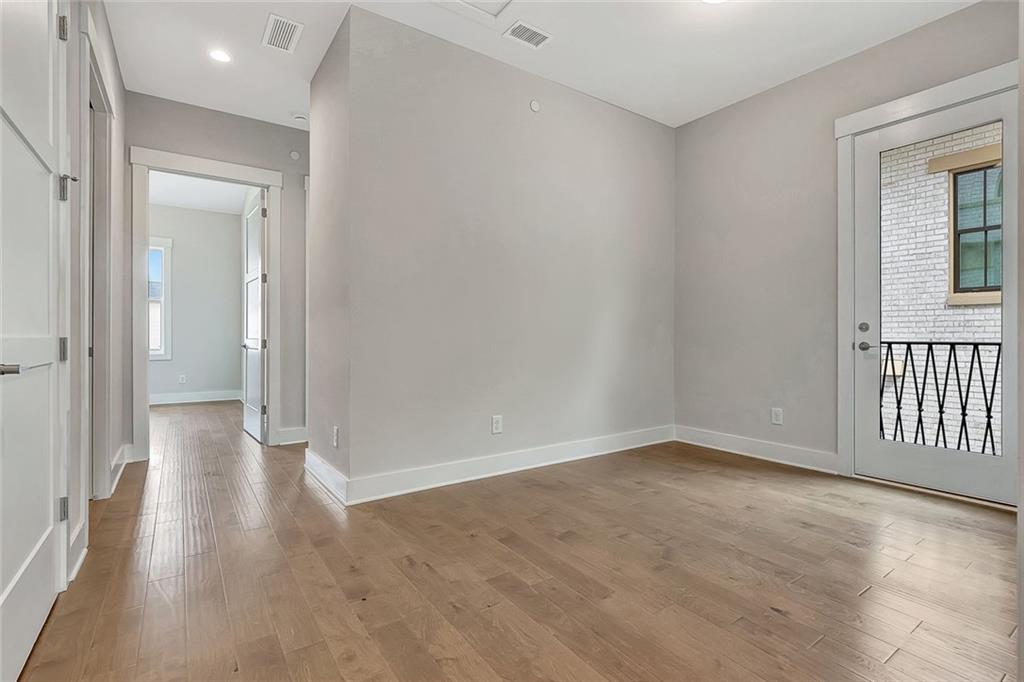 170 Rolison Way Fayetteville, GA 30214 - Photo 23 of 49 a view of an empty room with wooden floor