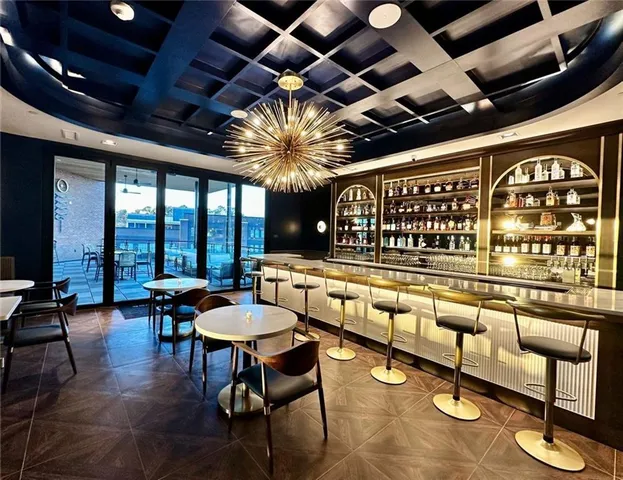 a view of a building with car parked