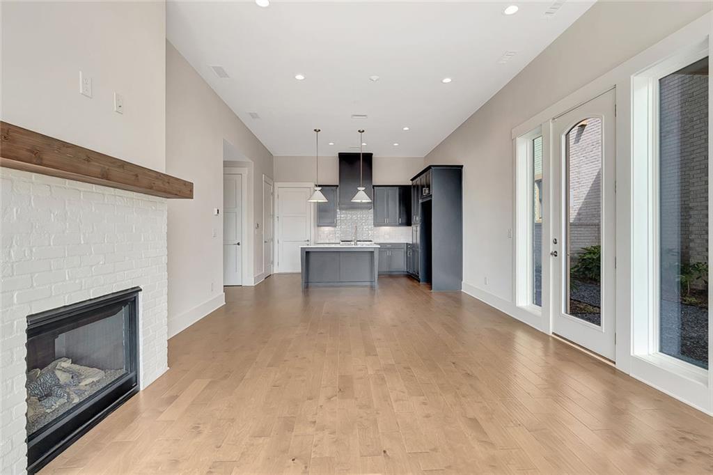 170 Rolison Way Fayetteville, GA 30214 - Photo 6 of 49 a view of a living room a livingroom with furniture and a fireplace