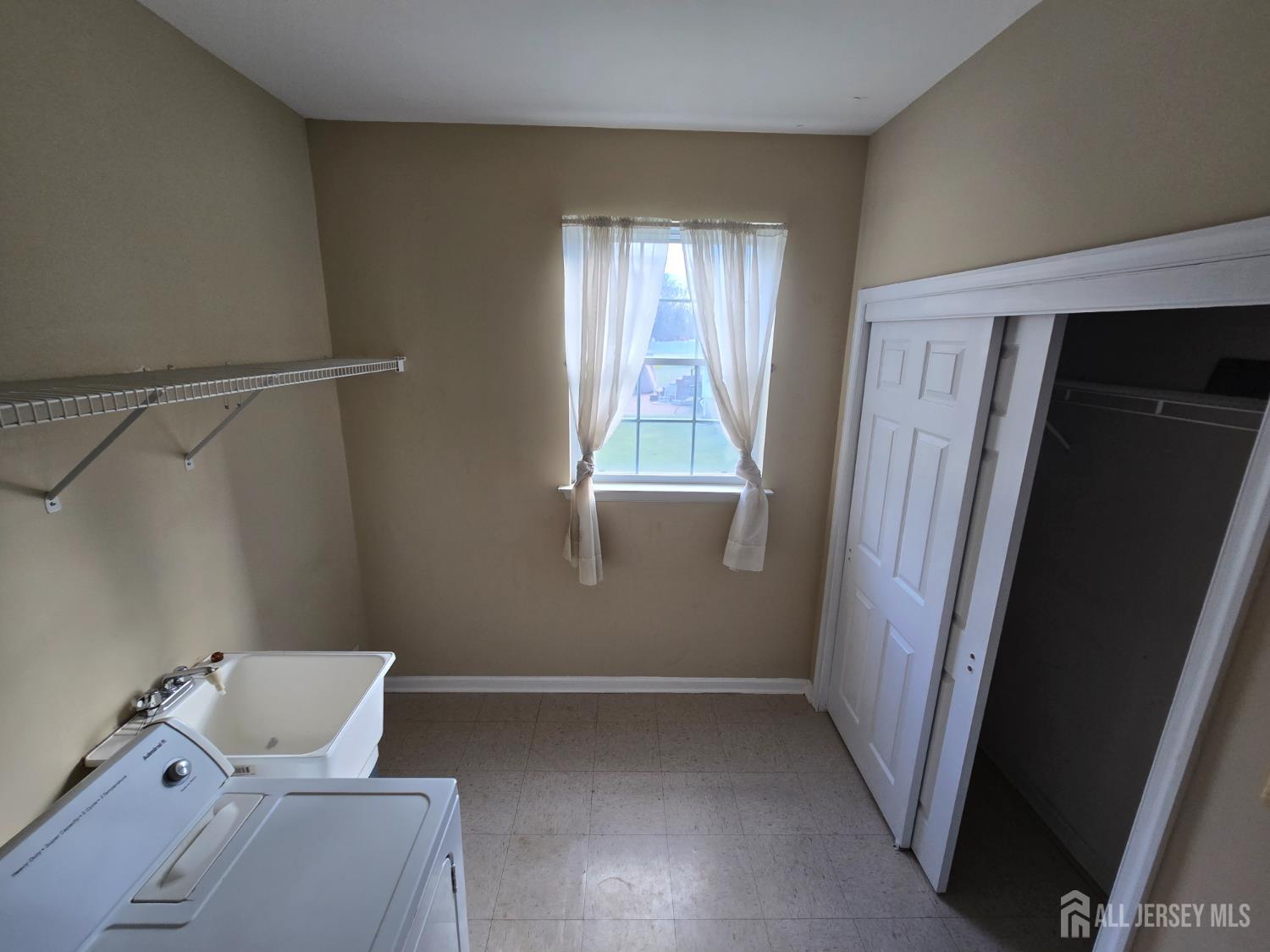 40 Potomac Road Monmouth Junction, NJ 08852 - Photo 16 of 48 a bathroom with a bathtub and shower