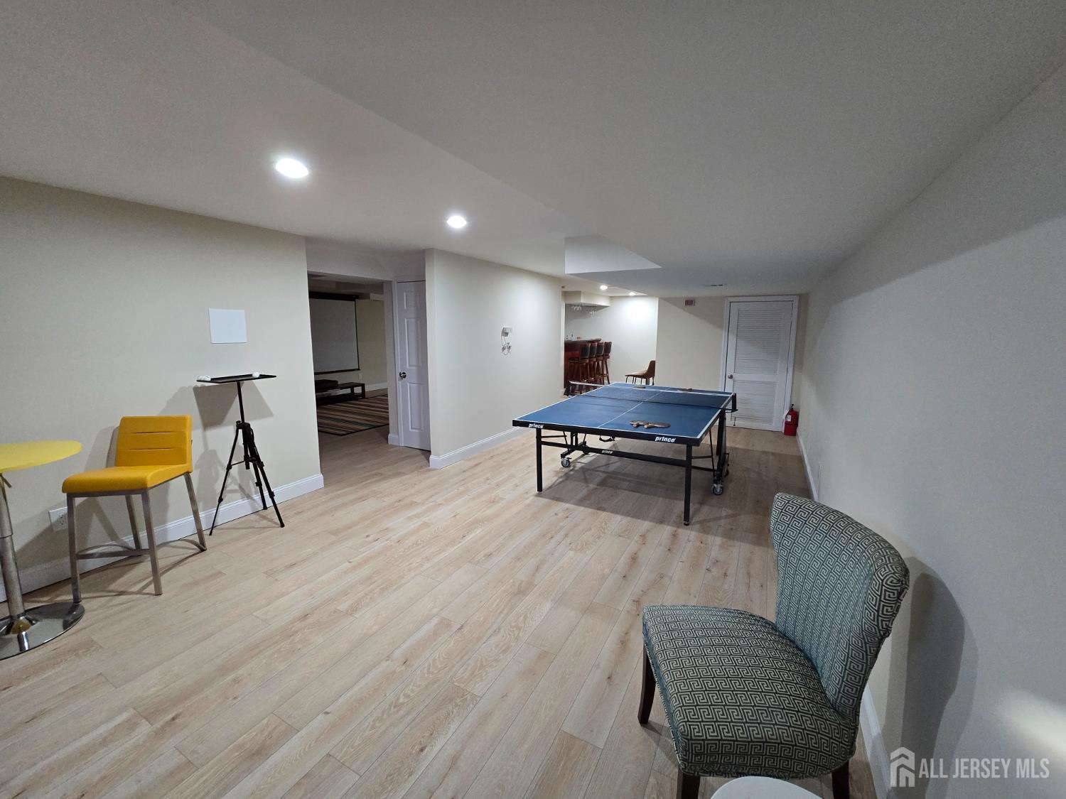 40 Potomac Road Monmouth Junction, NJ 08852 - Photo 18 of 48 a living room with furniture and a wooden floor