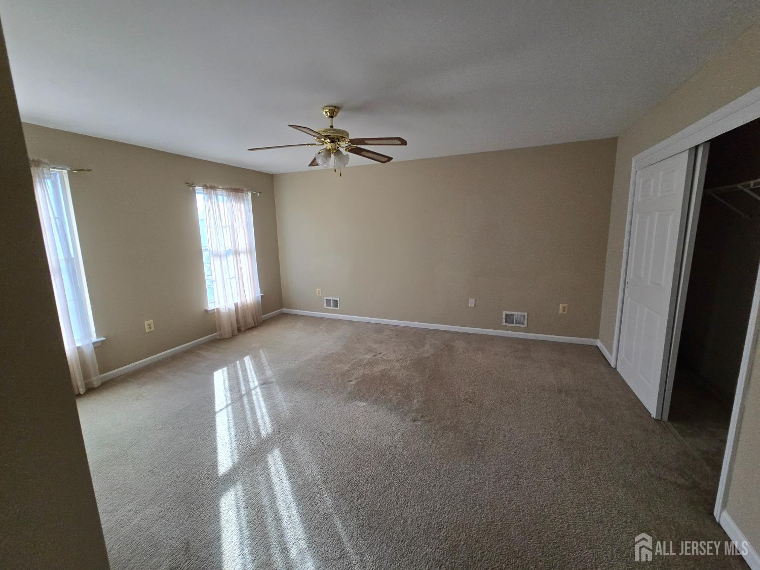 40 Potomac Road Monmouth Junction, NJ 08852 - Photo 25 of 48 a view of room with a ceiling fan and window