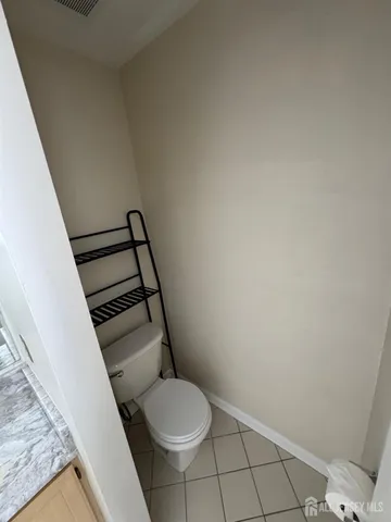 a bathroom with a toilet