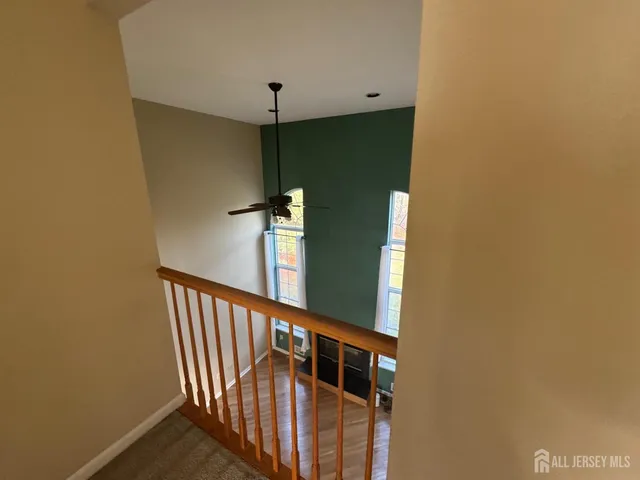 a view of a hallway with a white door