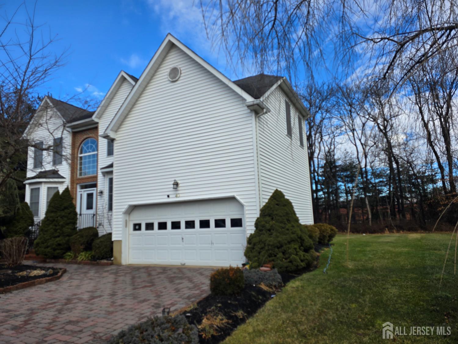 40 Potomac Road Monmouth Junction, NJ 08852 - Photo 4 of 48 a view of a house with a yard