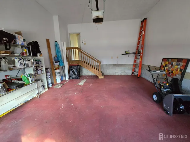 a view of game room with windows