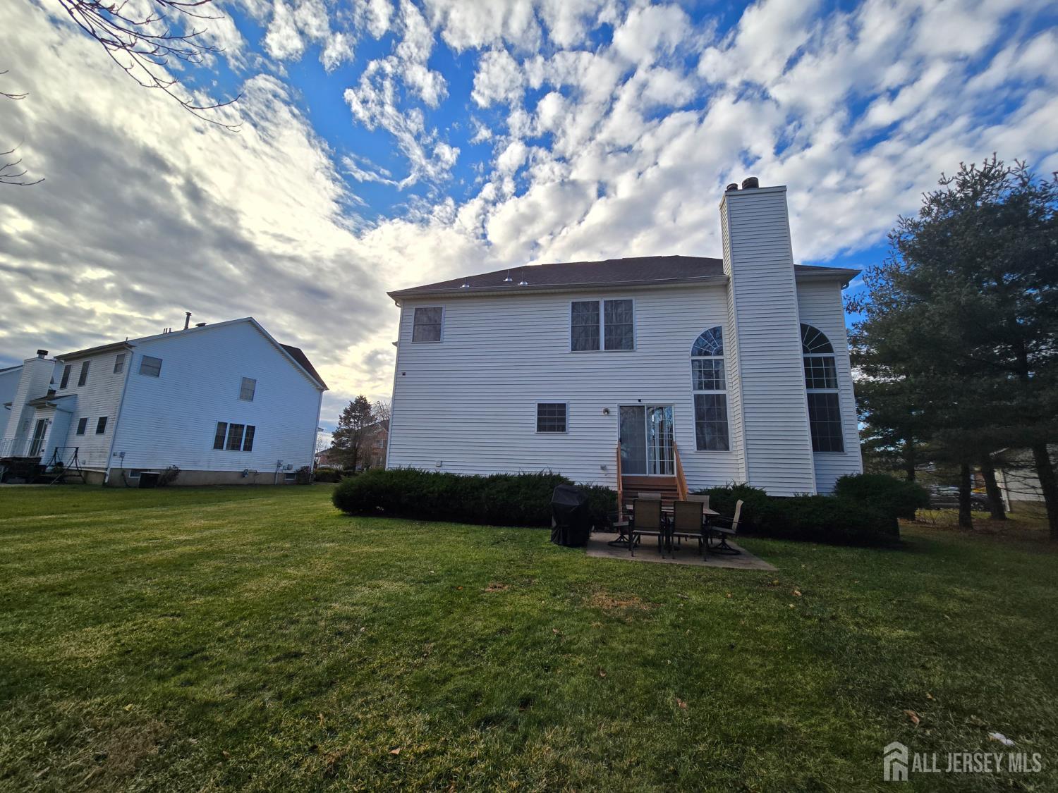 40 Potomac Road Monmouth Junction, NJ 08852 - Photo 43 of 48 a backyard of a house with lots of green space