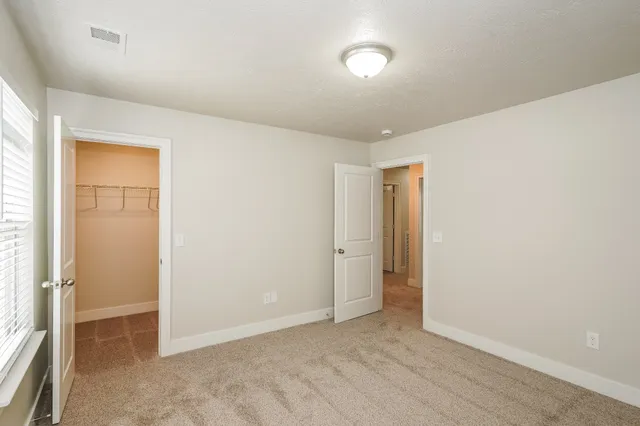 an empty room with a natural light