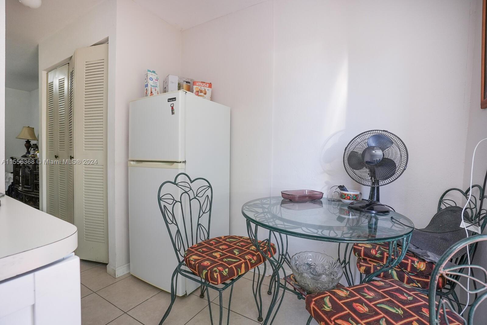 8461 Southwest 38th Street Miami, FL 33155 - Photo 18 of 27 a view of a dining room with furniture
