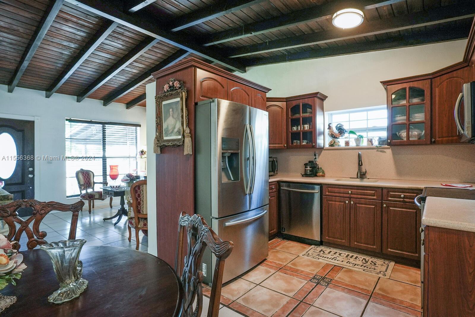 8461 Southwest 38th Street Miami, FL 33155 - Photo 7 of 27 a kitchen with lots of counter top space