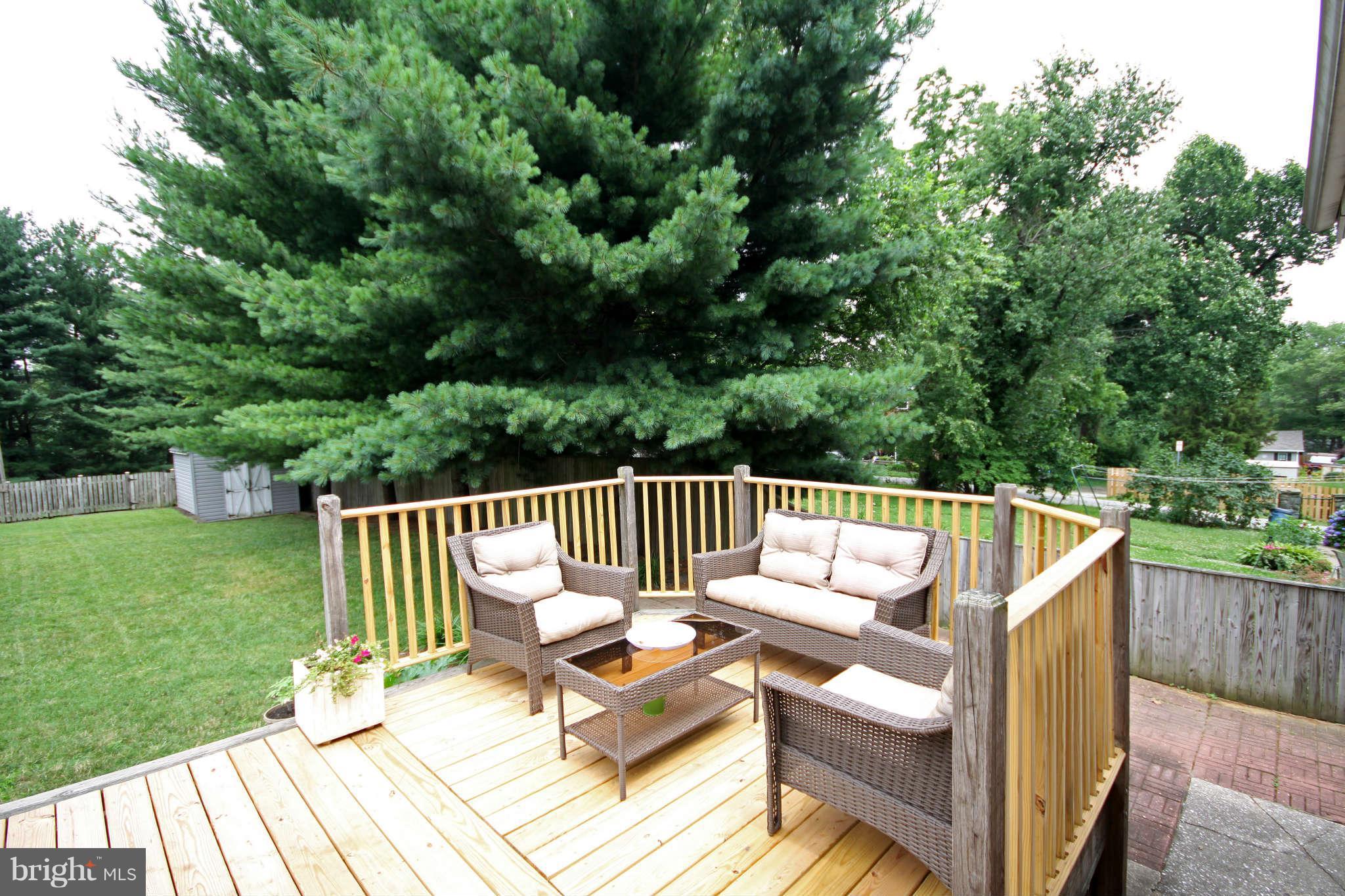 603 Academy Road Baltimore, MD 21228 - Photo 25 of 30 a view of deck with a patio
