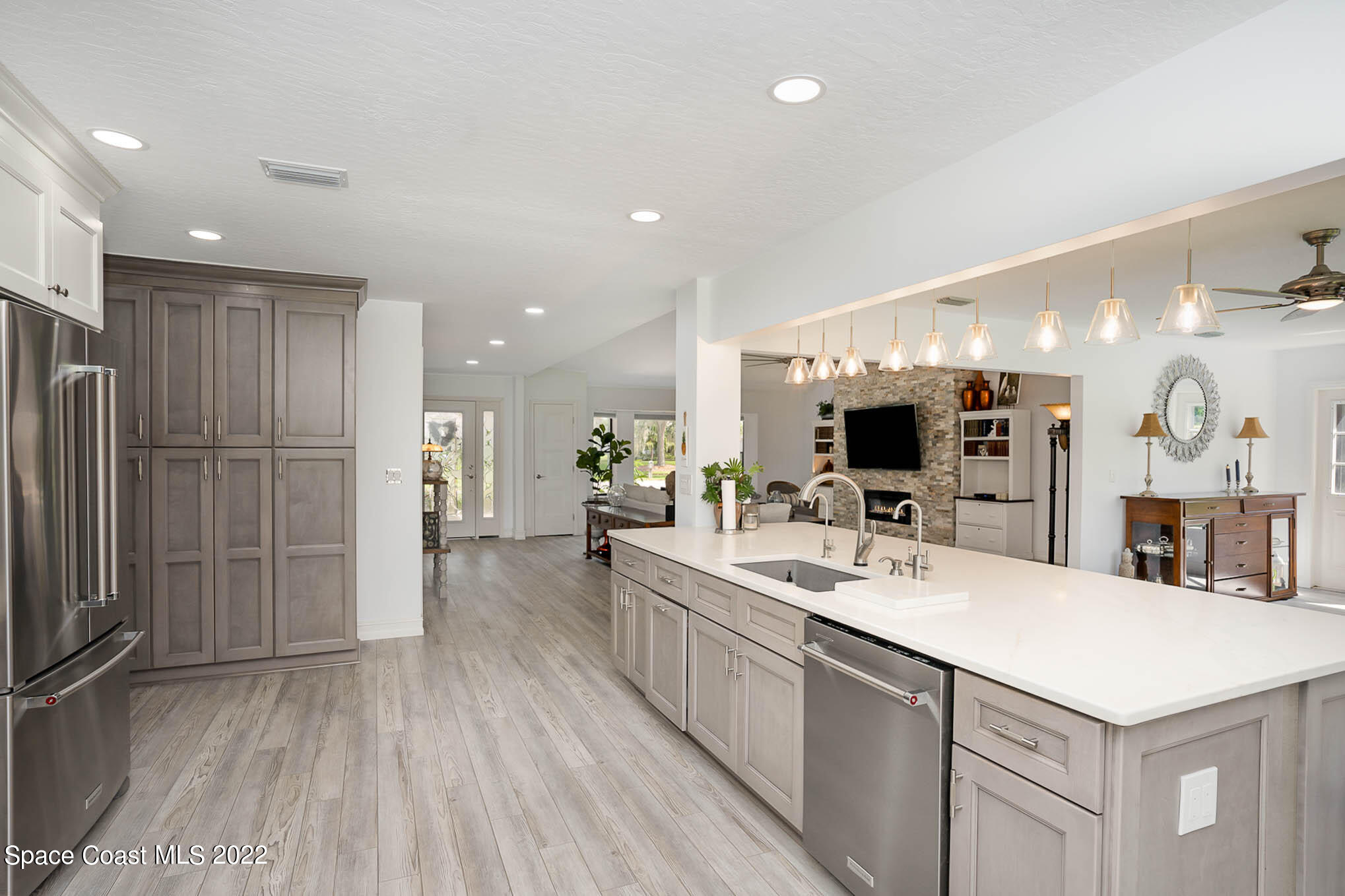 1425 Kitty Hawk Way Melbourne, FL 32940 - Photo 26 of 53 a large kitchen with a lot of counter space