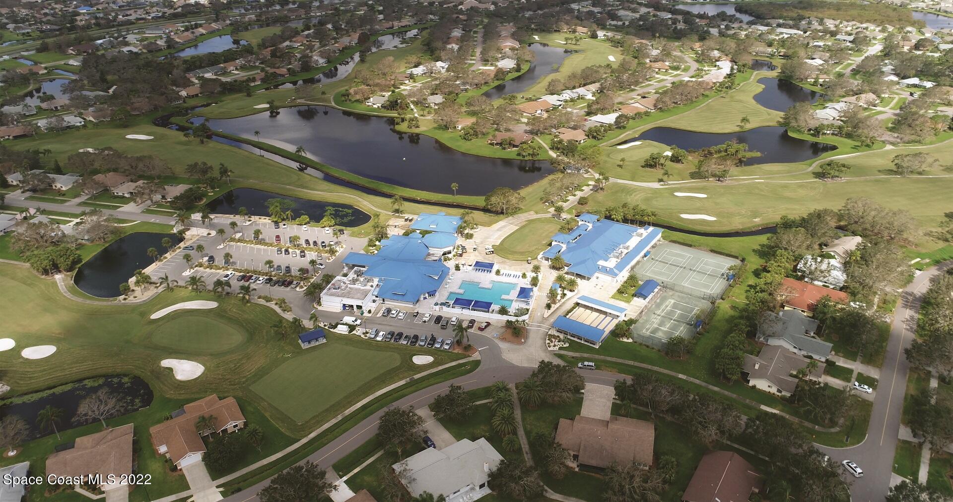 1425 Kitty Hawk Way Melbourne, FL 32940 - Photo 35 of 53 an aerial view of a house with a yard