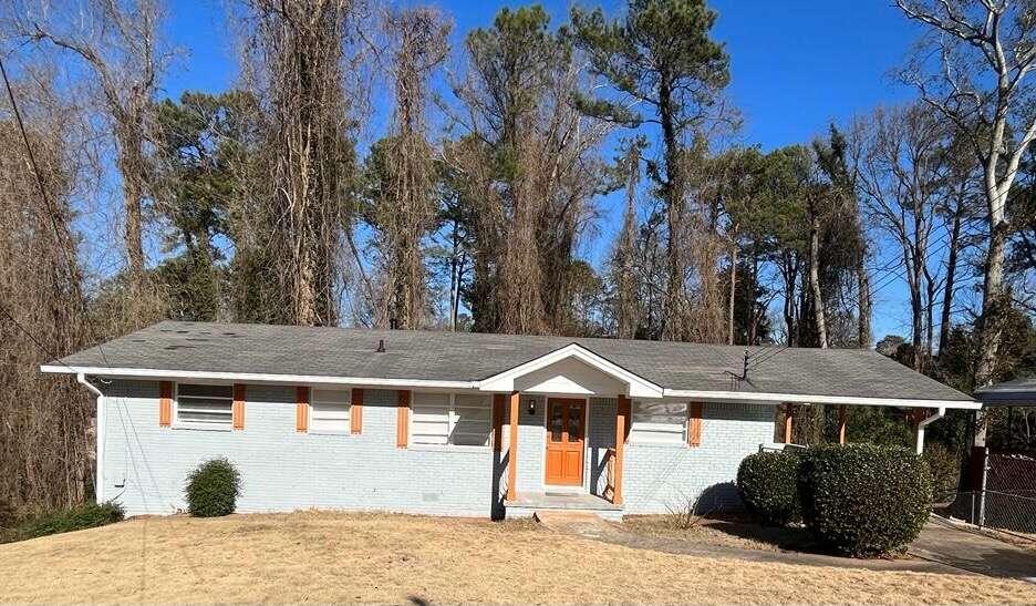 3621 Hillsborough Lane Decatur, GA 30032 - Photo 1 of 1 a front view of a house with a yard