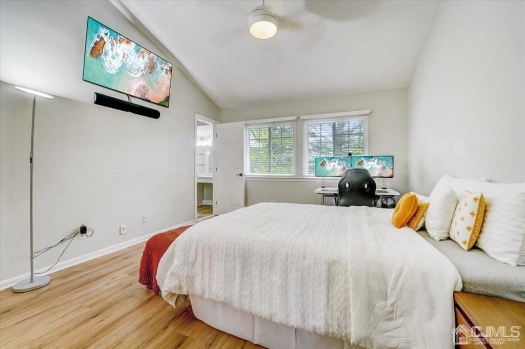 9 Tory Court Bedminster, NJ 07921 - Photo 16 of 26 a bedroom with a bed and a flat screen tv