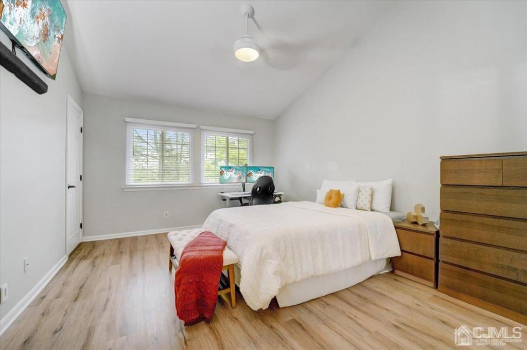 9 Tory Court Bedminster, NJ 07921 - Photo 17 of 26 a bedroom with a bed and wooden floor