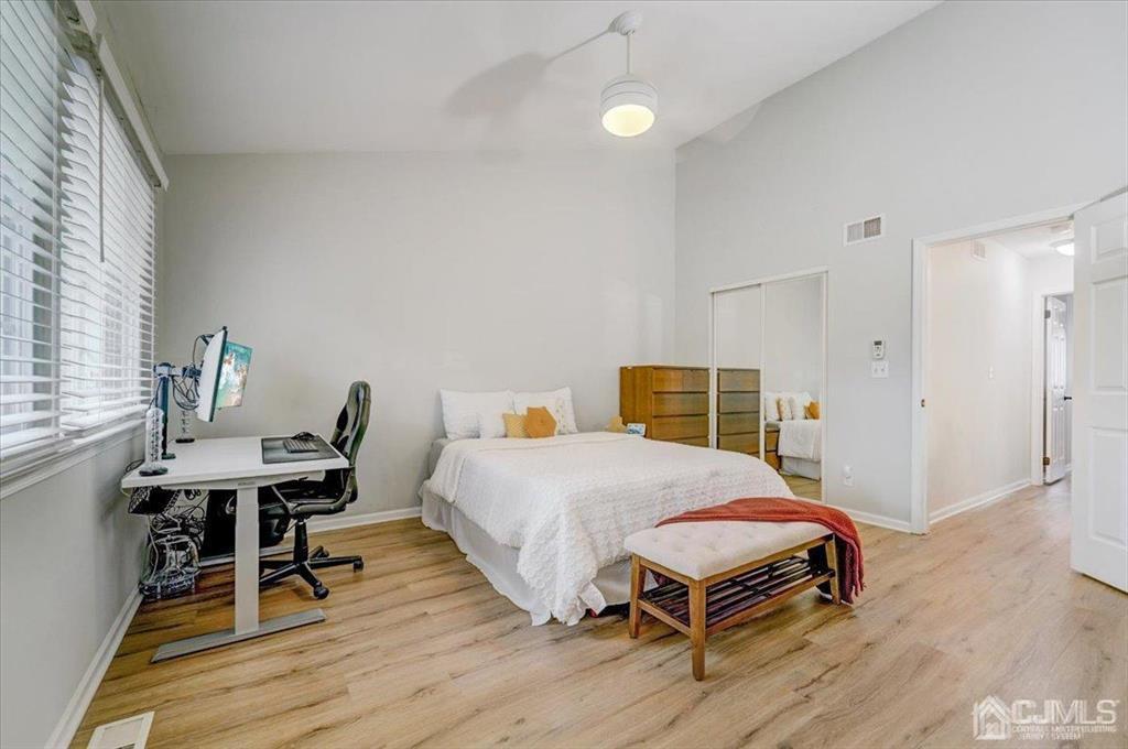 9 Tory Court Bedminster, NJ 07921 - Photo 18 of 26 a bedroom with a bed and a table