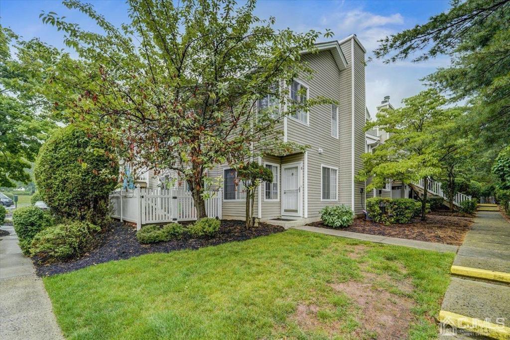 9 Tory Court Bedminster, NJ 07921 - Photo 2 of 26 a front view of a house with garden