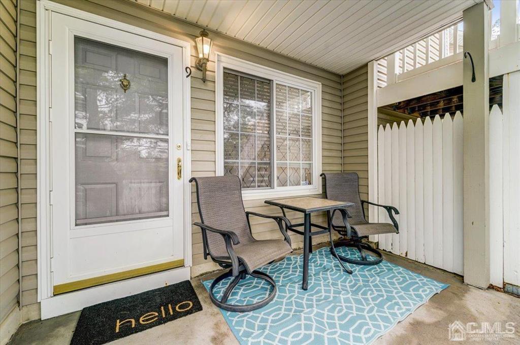 9 Tory Court Bedminster, NJ 07921 - Photo 3 of 26 a view of a workspace with furniture and a window