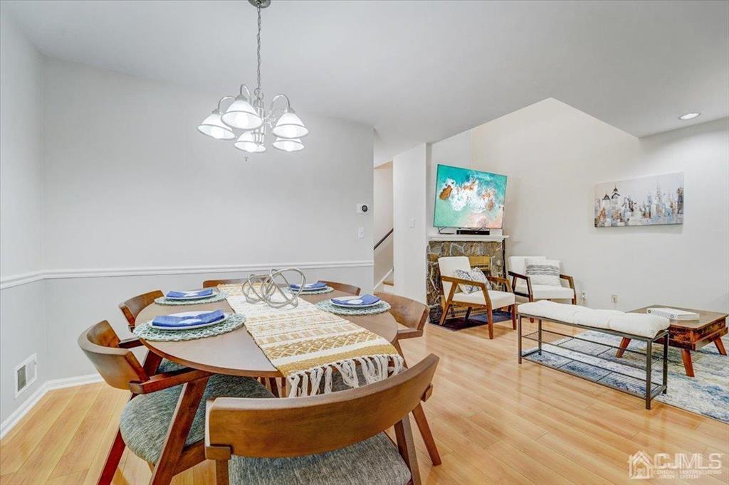 9 Tory Court Bedminster, NJ 07921 - Photo 9 of 26 a view of a dining room with furniture