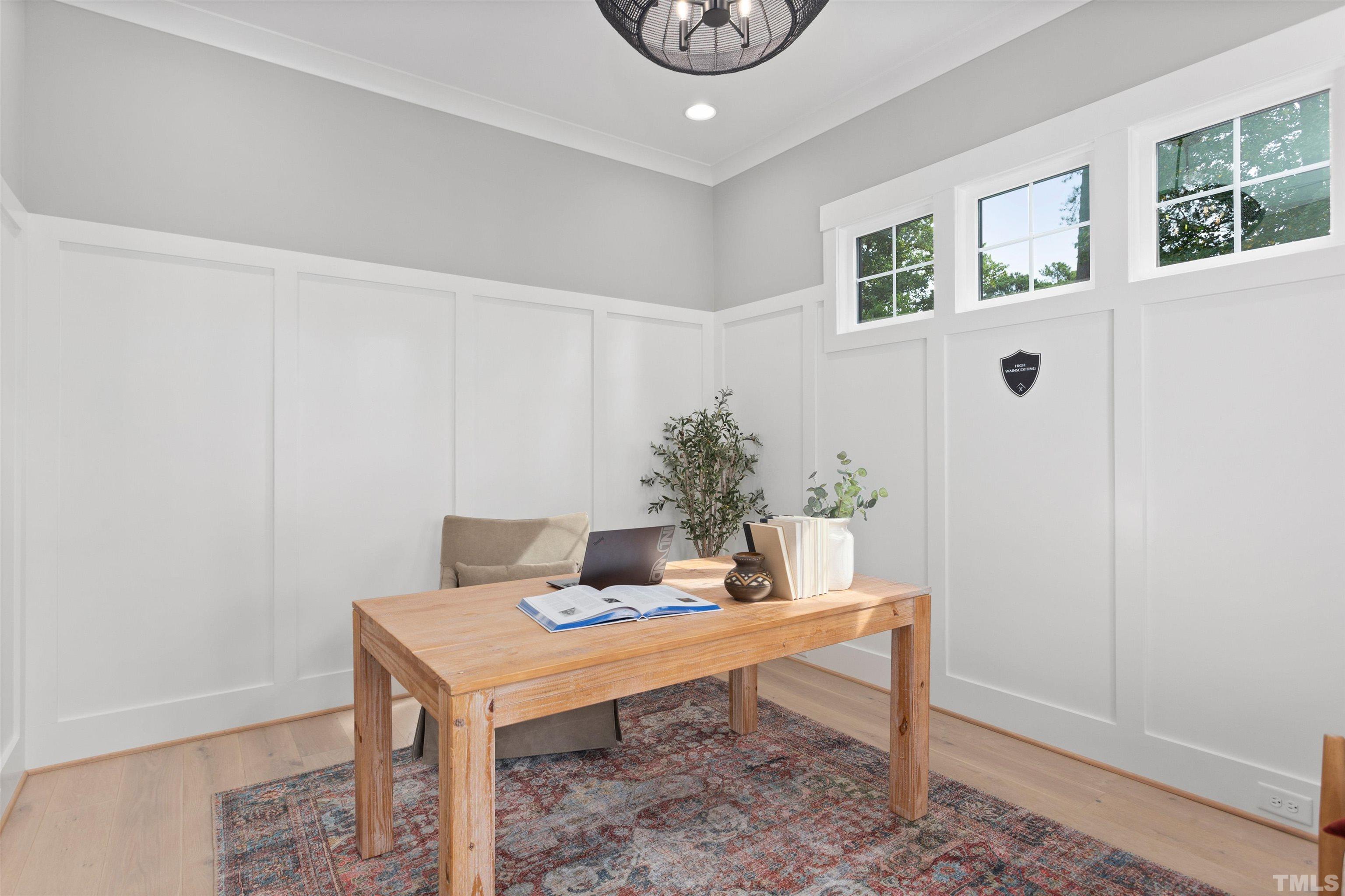 3508 Leonard Street Raleigh, NC 27607 - Photo 7 of 54 a room with furniture and window