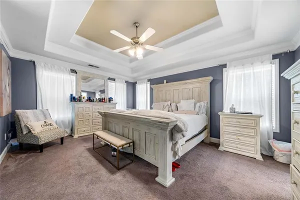 a bed room with a bed and furniture