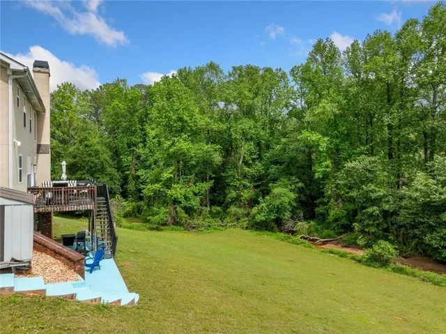 an aerial view of residential house with outdoor space