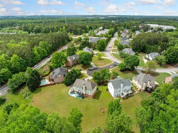 an aerial view of residential house with outdoor space
