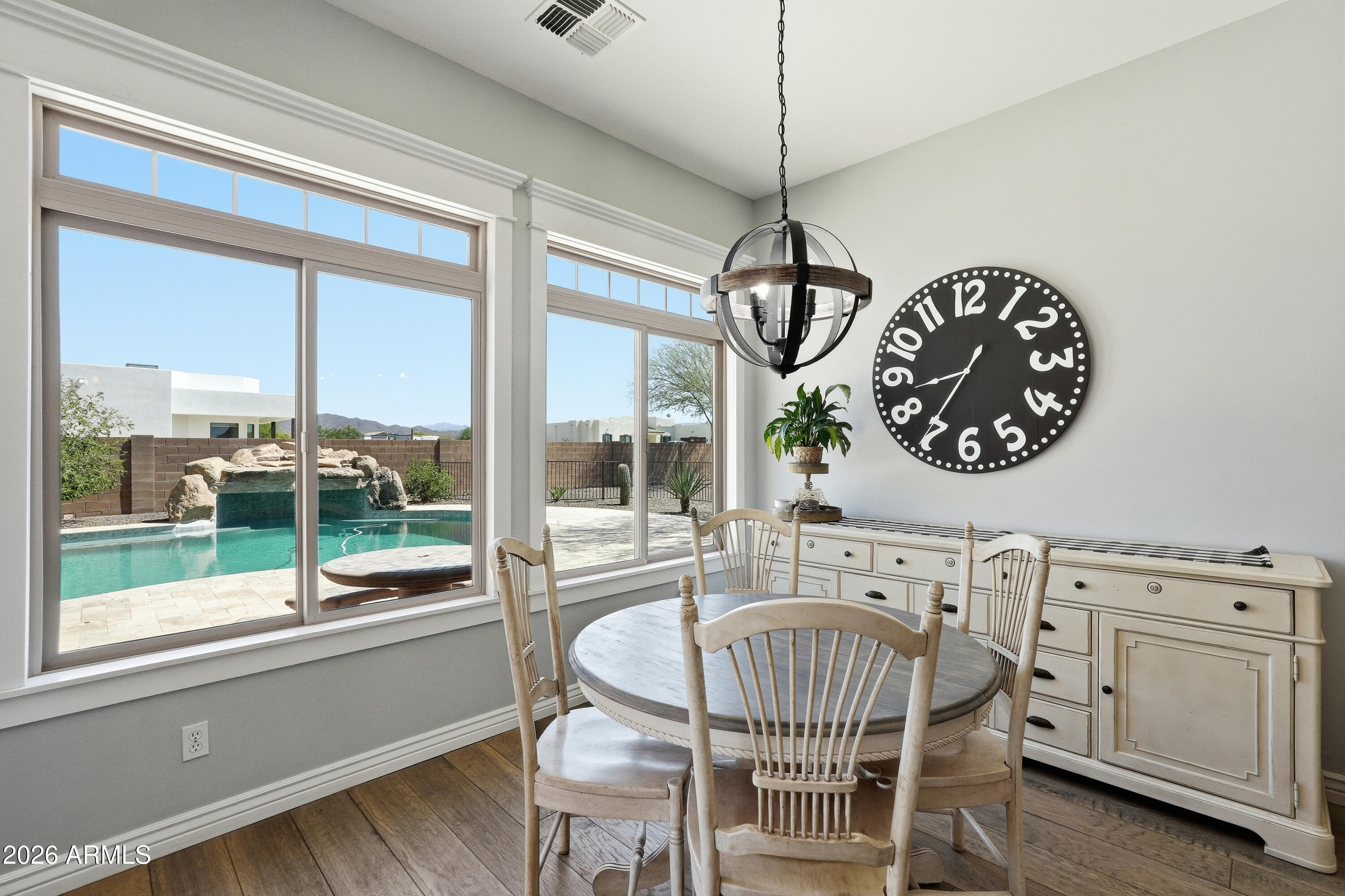 2616 West Canyon Road Phoenix, AZ 85086 - Photo 14 of 45 a view of a dining room with furniture window and outside view