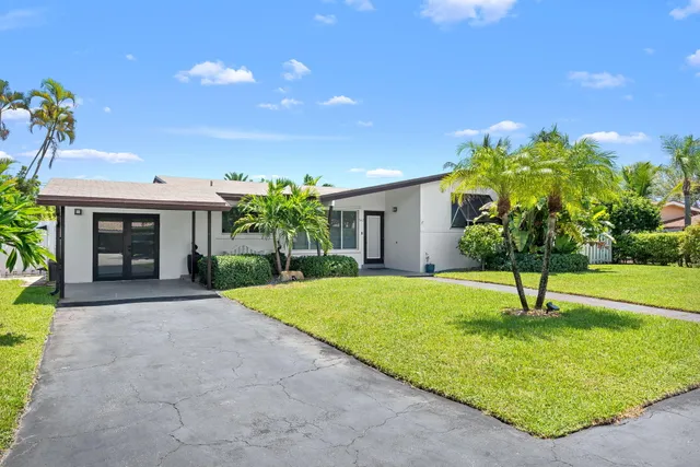 a house view with a garden space