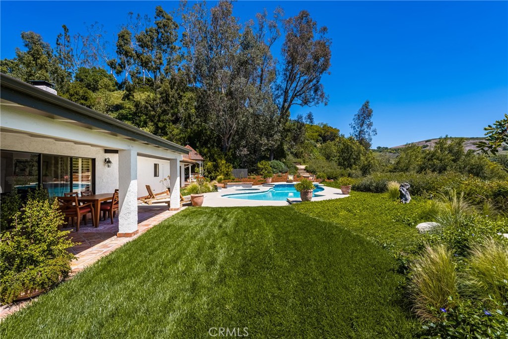 9741 Rangeview Drive North Tustin, CA 92705 - Photo 22 of 48 a view of a house with backyard and sitting area