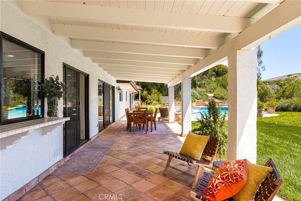 9741 Rangeview Drive North Tustin, CA 92705 - Photo 24 of 48 The patio is roughly 400 square feet with room for two or even three dining tables or add an outdoor pool/ping pong table! It is fully covered and therefore can be enjoyed all year long!