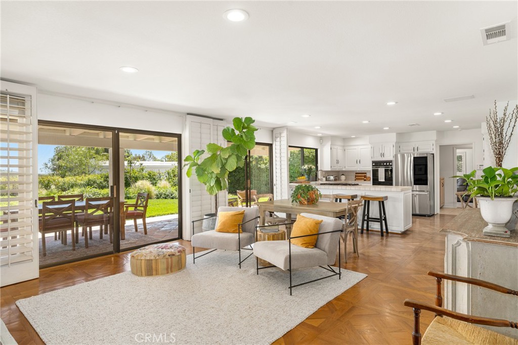 9741 Rangeview Drive North Tustin, CA 92705 - Photo 2 of 48 a living room with furniture and a floor to ceiling window