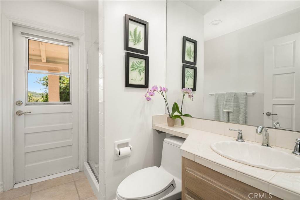 9741 Rangeview Drive North Tustin, CA 92705 - Photo 31 of 48 Fourth bath with pool access has hand-held shower head perfect for dog-lovers.